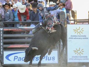 Prince Albert's Tanner Byrne rides Attitude Due at The Ranchman's PBR Bullbustin in support of the Sheldon Kennedy Child Advocacy Centre on Thursday. He finished third on the night, which is a great tuneup for bullriders heading into the Calgary Stampede.