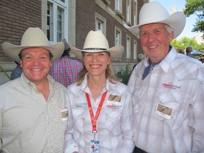 Cal 0711 Field 2   Pictured, from left, at Field Law's annual Stampede bash-held July 2 at the Ranchmen's Club are Heart & Stroke Foundation CEO David Sculthorpe, Tourism Calgary CEO Cindy Ady and Tourism Calgary board chair Rod McKay.