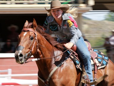 Sidney Daynes from Innisfail AB competes in the barrel racing event during day 1 of the Calgary Stampede rodeo on  Friday July 3, 2015.