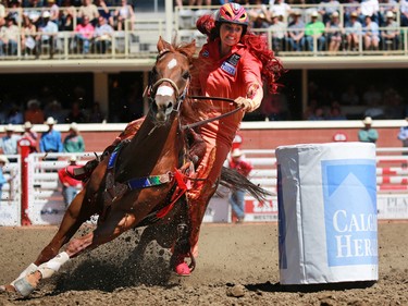 Fallon Taylor from Collinsville Texas competes in the barrel racing event during day 1 of the Calgary Stampede rodeo on  Friday July 3, 2015.