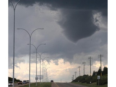 A distinct funnel cloud forms over Tsuu T'ina Wednesday afternoon July 22, 2015.