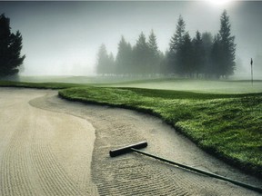 In this image the rake and the edge of the bunker make for nice leading lines to draw the eye into the scene. (Andrew Penner/Calgary Herald) For Outdoors  story by Andrew Penner.