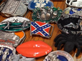 The confederate flag is for sale on belt buckles and flags on Saturday, July 4, 2015 at the Calgary Stampede.