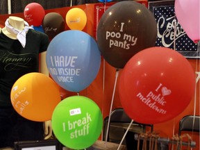 Balloons with all kinds of sayings, including these ones that are for children, are among the weird things you could buy at the Calgary Stampede on July 6, 2015.