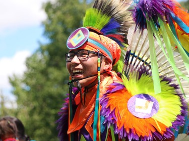 Blake Yellowhorn, a First Nations dancer, performs during a powwow on Prince's Island on Canada Day 2015.