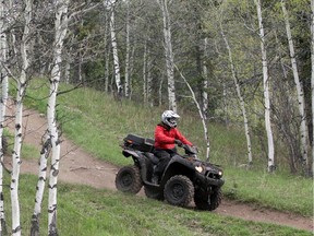 An ATV is ridden through the Chain Lakes area.