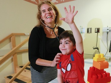 Pediatric Rheumatologist Dr. Susanne Benseler checks on Ben Anderson, 4,  at the Alberta Children's hospital on Tuesday. Dr. Benseler recently diagnosed Ben with an extremely rare form of pediatric vasculitis called Takayasu's Arteritis.  He was fortunate to be at the Alberta Children's Hospital which is part of an international network of researchers pooling their knowledge of the disease.