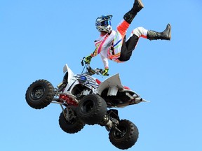 Freestyle quad rider Cody Elkins performs at the Bell Adrenaline Ranch at the Calgary Stampede.