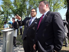 Calgary Mayor Naheed Nenshi and Minister of National Defence and Minister for Multiculturalism Jason Kenney at the announcement of federal funding for the new Calgary Transit Green LRT Line.