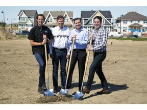 Kevin Logel, Tim Logel Brad Logel and Brayden Logel of Cardel Lifestyles are part of the first shovel turning at Auburn Walk.