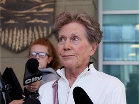 Carole Knopp speaks with reporters at the Calgary Courts Centre about the harm done by the multimillion Ponzi scheme orchestrated by Gary Sorenson and Milowe Brost.