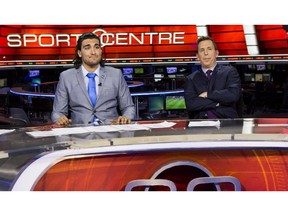 Elias Theodorou, left, shows his frustration during the Road Block at TSN in Toronto alongside broadcaster Scott Duthie during the premiere of Season 3 of The Amazing Race Canada.
