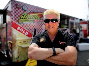 Dougie Luv at his Dougie Dog Diner Truck at the Calgary Stampede on July 8, 2015. He is sold out of his $100 Dragon Dogs.