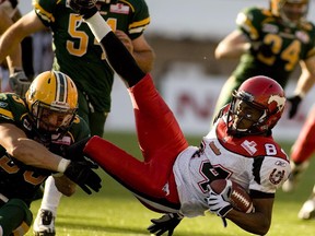 Former Edmonton Eskimo Corbin Sharun, left, says he's looking forward to playing on the other side of the Battle of Alberta after the Stampeders added him to the practice roster on Tuesday.