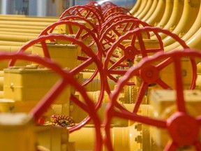 Gas pipes are photographed at a gas compressor station.