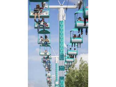 The WestJet sky ride is full of parents with kids during the Stampede's Family Day in Calgary, on July 5, 2015. -