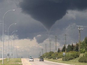 A distinct funnel cloud forms over Tsuu T'ina Wednesday afternoon.
