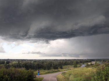 Menacing clouds swirl towards Douglasdale Ridge Wednesday, July 22, shortly after the storm had spawned a funnel cloud west of Calgary.