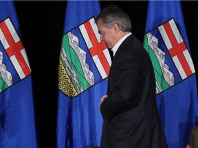 Jim Prentice walks off the stage at his campaign headquarters after his party lost the May 5 provincial election.