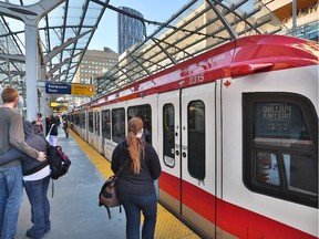 Commuters at the City Hall CTrain station.