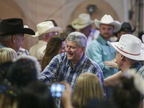 Prime Minister Stephen Harper meets supporters at Heritage Park in Calgary on Saturday, July 4, 2015.