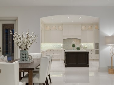 The dining nook and kitchen at 302 Hawk's Nest Hollow in Priddis.