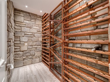 The wine cellar at 302 Hawk's Nest Hollow in Priddis.