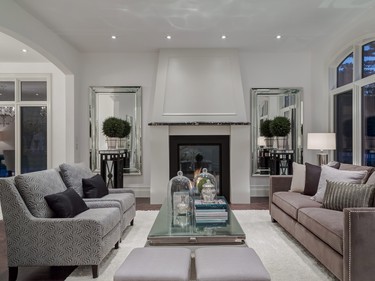 The front living room at 302 Hawk's Nest Hollow in Priddis.