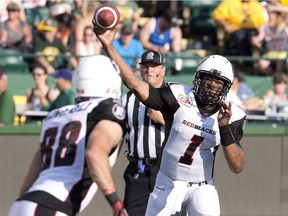 Ottawa Redblacks quarterback Henry Burris passes to Brad Sinopoli in a game against the Edmonton Eskimos on July 9. Ottawa, who will host the Calgary Stampeders on Friday, started the season 2-0 before back-to-back losses to Edmonton have them back in the head-scratching stage.