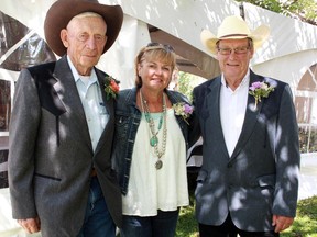 Pioneers of the Rodeo inductees into the hall of fame included  Art Klassen, left,  Monica Wilson and representing his father Bob Gooch, Lawrence Gooch.