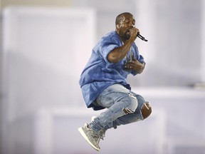 Kanye West performs during the closing ceremony of the 2015 Pan Am Games in Toronto on Sunday,. Reader said his torn jeans and behaviour were disrespectful to the games.