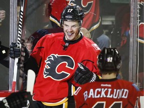 Calgary Flames' Lance Bouma, seen celebrating a goal during a game last January, netted a new three-year deal on Thursday.