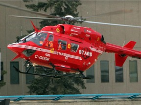 File photo of a STARS air ambulance landing at Foothills Medical Centre. A woman is in life-threatening condition after she was caught in an avalanche near Field, B.C.