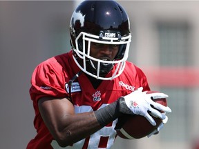 Calgary Stanpeders defensive back Buddy Jackson pulls in the ball during Wednesday's practice at McMahon Stadium.