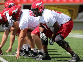 Offensive lineman Garry Williams, right, is preparing for his first taste of CFL action with the Stampeders Saturday against the visiting Winnipeg Blue Bombers.