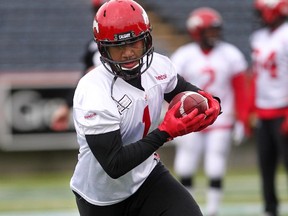 Calgary Stampeders wide receiver Lemar Durant carried the ball after a catch as he practiced with teammates at McMahon Stadium on July 16, 2015.