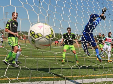 Calgary Foothills FC Hunter Brett wasn't able to stop this shot by the Seattle Sounders during a match against at Hellard Field on Sunday June 28, 2015.