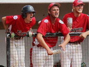 Calgary Cardinals players spur on their teammates during the Canadian Big League championship game at Foothills Stadium on Saturday. The win earned the team the right to represent Canada at the Big League World Series in Easley S.C., which began Tuesday.