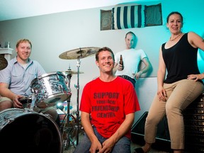 The Neutral States, consisting of Jonathan Hayden, left, Lee Shedden, Andrew Wedderburn, and Elescia Wojak,  practices for an upcoming show at the Palamino, in Calgary on Tuesday, July 21, 2015.