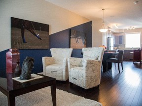 The great room in the Lockwood show home in the Legacy Street Towns by Homes by Avi.