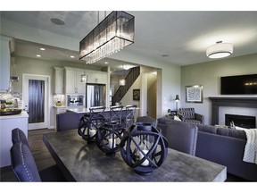 The dining area in the Monarch II, a show home by Calbridge Homes in Fireside, Cochrane.