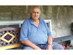 Ottavio Pio Marchesan, 75, has been charged with two counts of animal cruelty after police allege he strangled three cats, killing two, and disposing them in a Dumpster. He was photographed outside of his S.E. home on July 7, 2015.