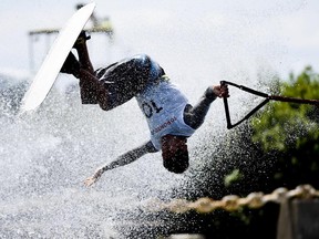 Jaret Llewellyn of Innisfail competes a trick during the men's overall waterskiing event at the Pan American Games in Toronto on Wednesday. Llewellyn  won silver.