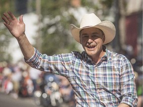 Joe Ceci waves to the crowds at the Calgary Stampede Parade in Calgary on Friday, July 3, 2015. He also attended Prime Minister Stephen Harper's barbecue on Saturday.