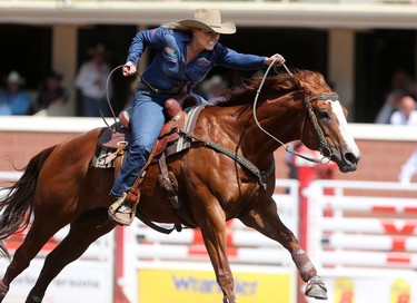 Tara Muldoon of Hinton, Alberta during the Calgary Stampede Barrel Racing Championship.