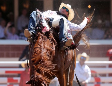 Kaycee Field of Spanish Fork, Utah rides Turkish Whiskey during the Calgary Stampede Bareback Championship.