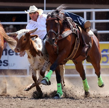 Cody Cassidy of Donalda, Alberta during the Calgary Stampede Steer Wrestling Championship.