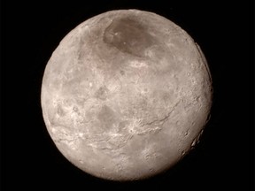 This Tuesday, July 14, 2015 image provided by NASA on Wednesday shows Pluto's largest moon, Charon, made by the New Horizons spacecraft.