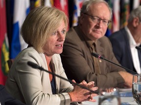Alberta Premier Rachel Notley, left, answers a question as Prince Edward Island Premier Wade MacLauchlan looks on at the closing news conference of the summer meeting of Canada's premiers in St. John's on Friday, July 17.