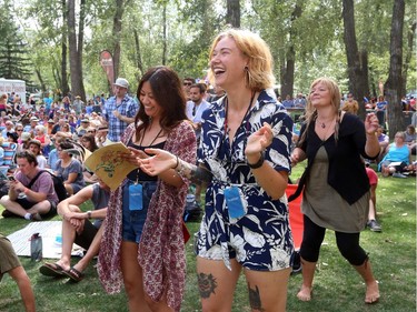 Theresa Jalotjot and Rae Fletcher dance and sway to Blues Swayed Shoes at the Folk Festival in Calgary, on July 24, 2015.